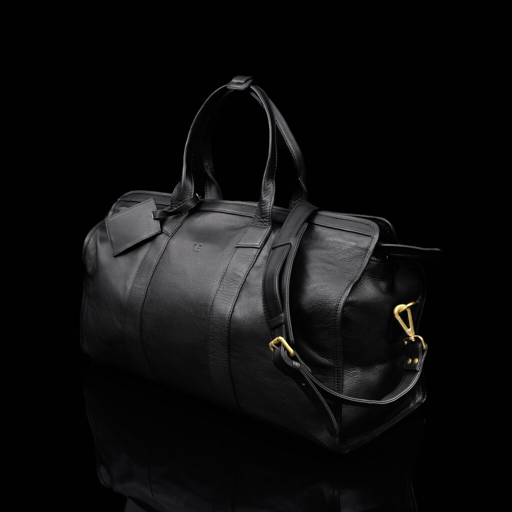 6 Weekender nahast reisikott õllarihm must