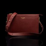 von baer clutch vaike nahast naiste kaekott punane eestvaade reguleeritav olarihm