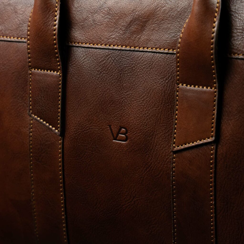 von baer exquisite nahast arvutikott pruun vb logo