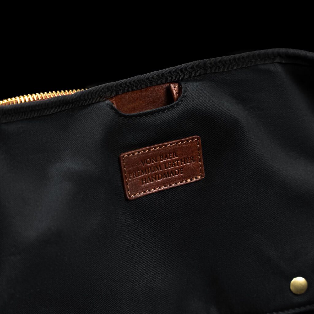 von baer grand nahast suur reisikott ulikonnalahtriga pruun ülikonnaga puuvillavooder